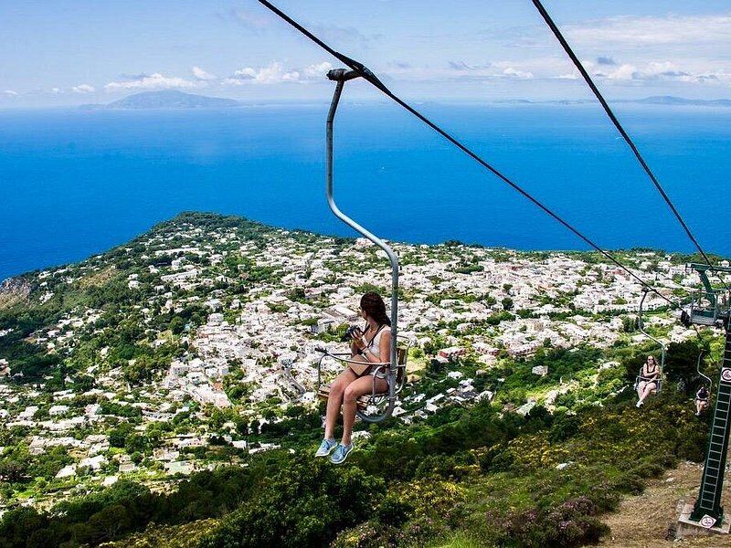 The single-seat chairlift climbing from Anacapri towards the summit of Monte Solaro